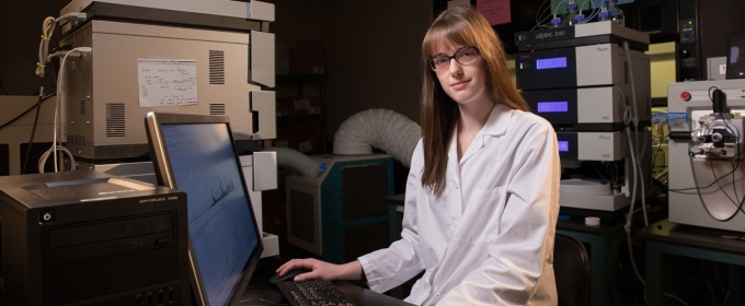 photo of woman in a lab with computer