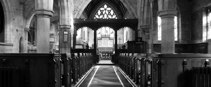 black and white photo of empty church sanctuary