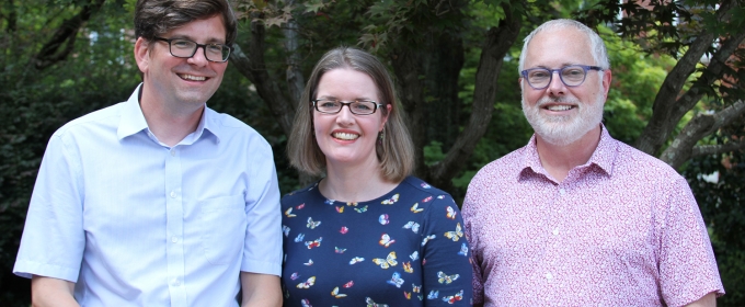 photo of three people, outdoors