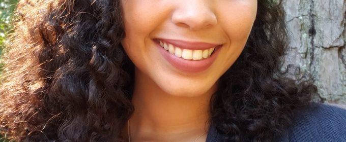 headshot photo of woman, outdoors