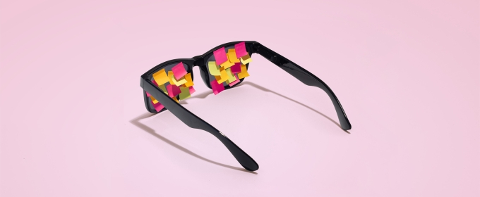 photo of sunglasses with small post-it notes on lenses