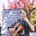 student playing guitar