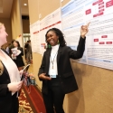 photo of two people at poster session