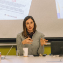 photo of woman seated at table, ppt