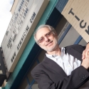 photo of man, marquee in background