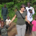 photo of children with woman and two men on path