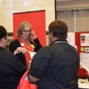 staff members interacting at a booth